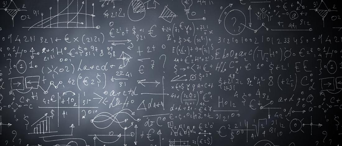 Science and math equations on chalkboard